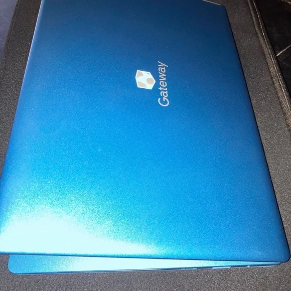Fairly New Blue Gateway Laptop Used Twice. Charger Comes With Mouse.